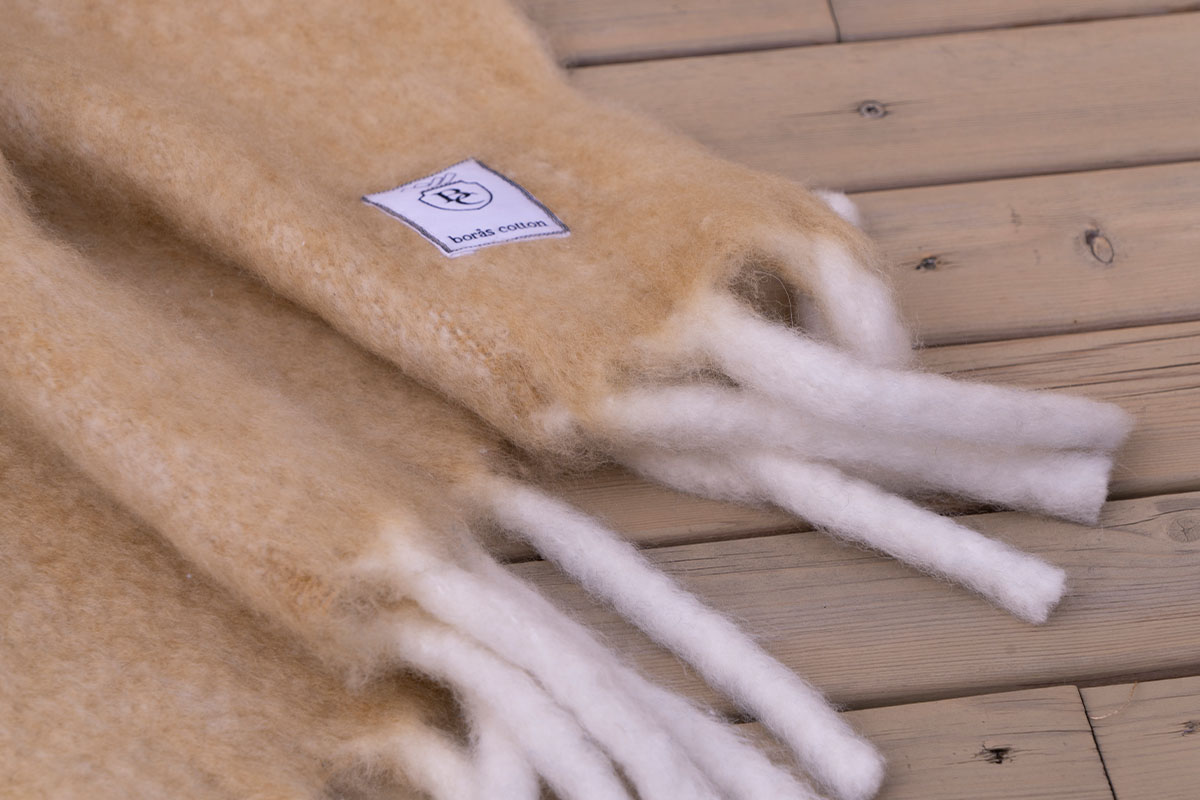 Hos Miljonlotteriet kan du vinna en pläd från Borås Cotton