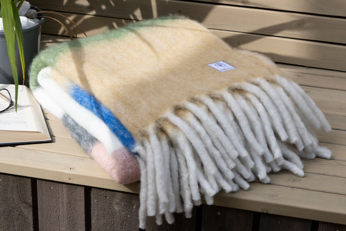 Hos Miljonlotteriet kan du vinna en pläd från Borås Cotton